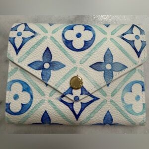 Louis Vuitton Victorine wallet By The Pool 2024 lagoon